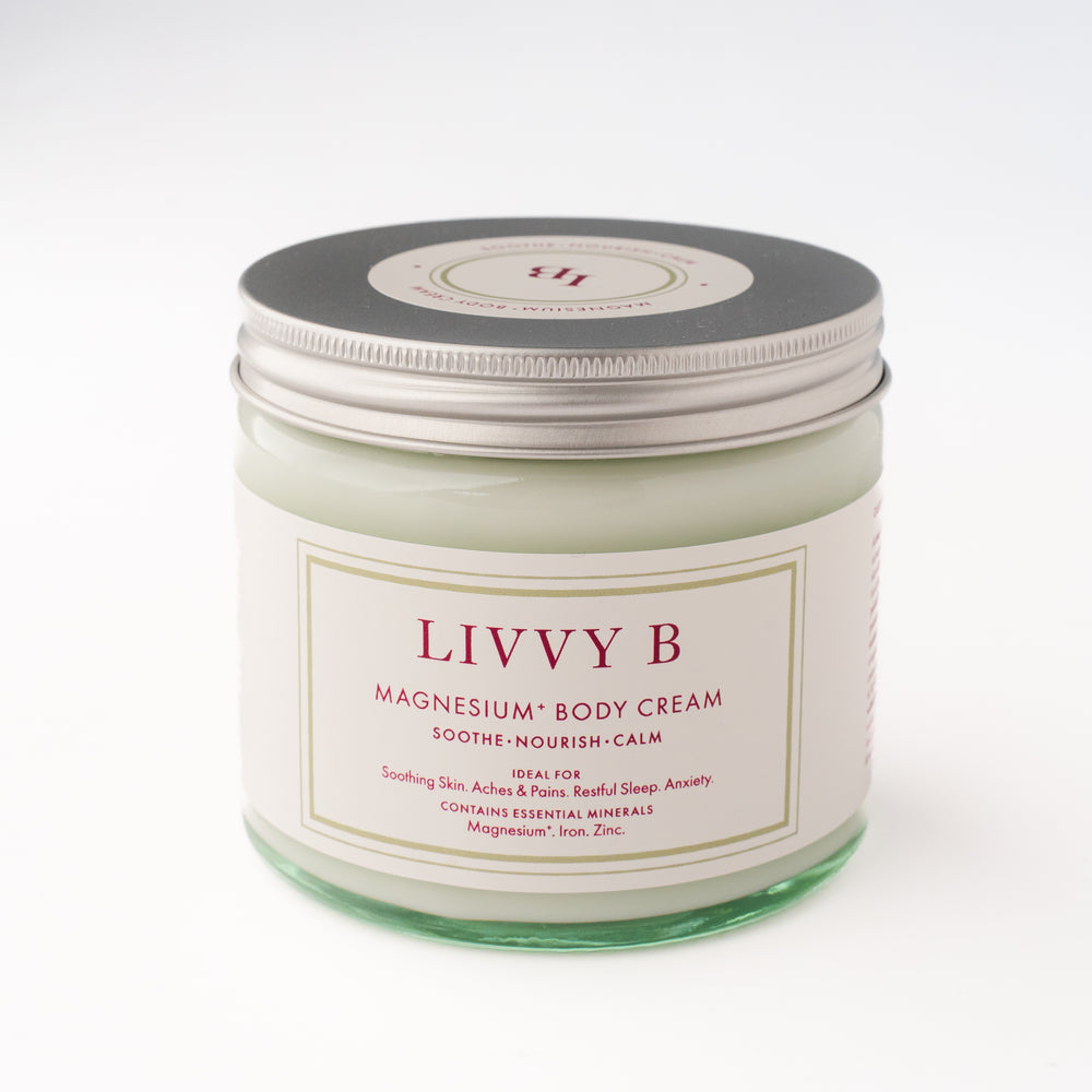 Jar of Livvy B magnesium body cream on a white background